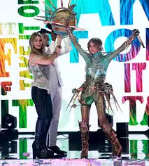 🎭✨ FROM SNL DISASTER TO MASKED